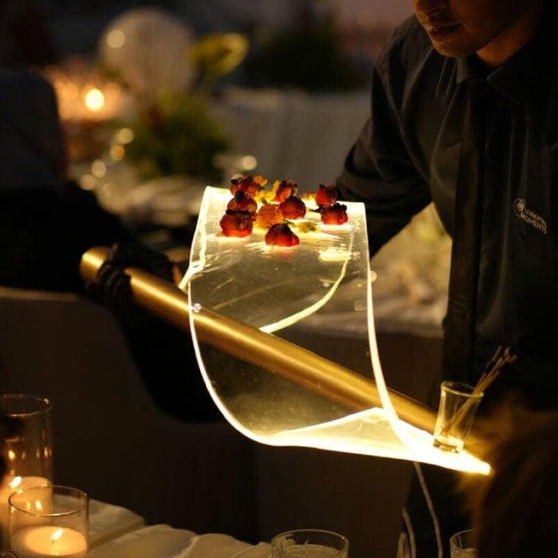 Salmon gravlax canapé served on LOriental's Infinity Wave theatrical presentation platform Salmon gravlax canapé served on LOriental's Infinity Wave theatrical presentation platform